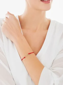 Bransoletka z elementami żółtego złota i diamentem - nieskończoność, litera A, serce - 0,005 ct - próba 375