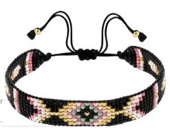 Bransoletka z elementami z żółtego złota i koralikami