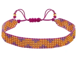 Bransoletka z elementami z żółtego złota i koralikami