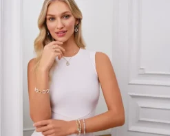 Bransoletka z mosiądzu pozłacana z kamieniami księżycowymi i cyrkoniami - kwiat