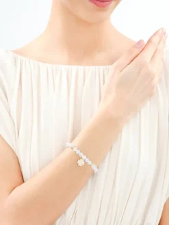 Bransoletka z mosiądzu pozłacana z kwarcami i cyrkoniami - koniczyna