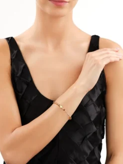 Bransoletka z mosiądzu pozłacana ze szklanymi detalami - serce