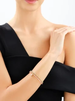 Bransoletka z mosiądzu pozłacana z cyrkoniami i szklanymi detalami - serce