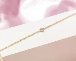 Bransoletka z żółtego i białego złota z diamentem - 0,007 ct - próba 375