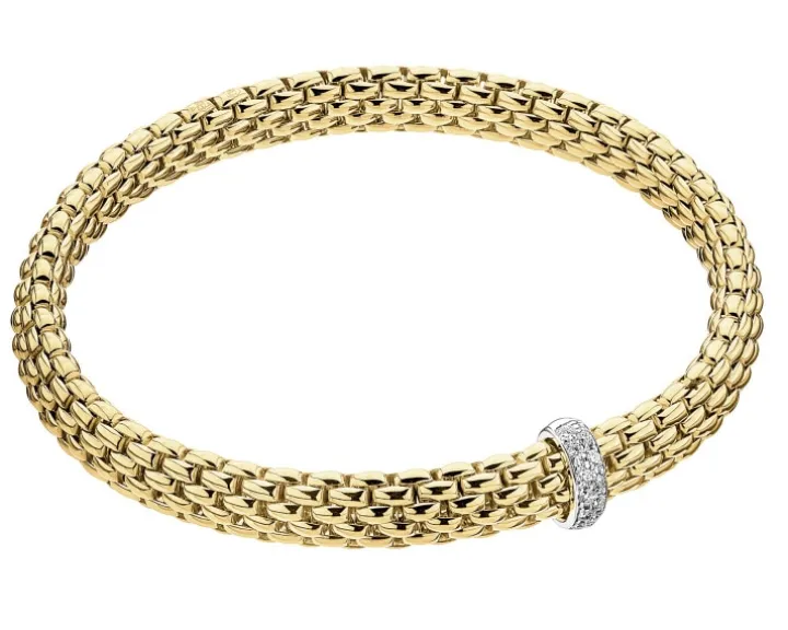 Bransoletka z żółtego i białego złota z brylantami - 0,10 ct - próba 750