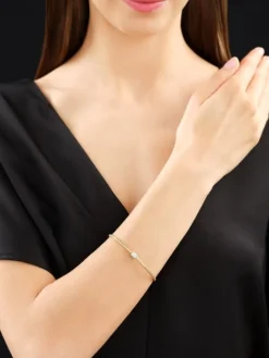 Bransoletka z żółtego i białego złota z brylantami - 0,13 ct - próba 750