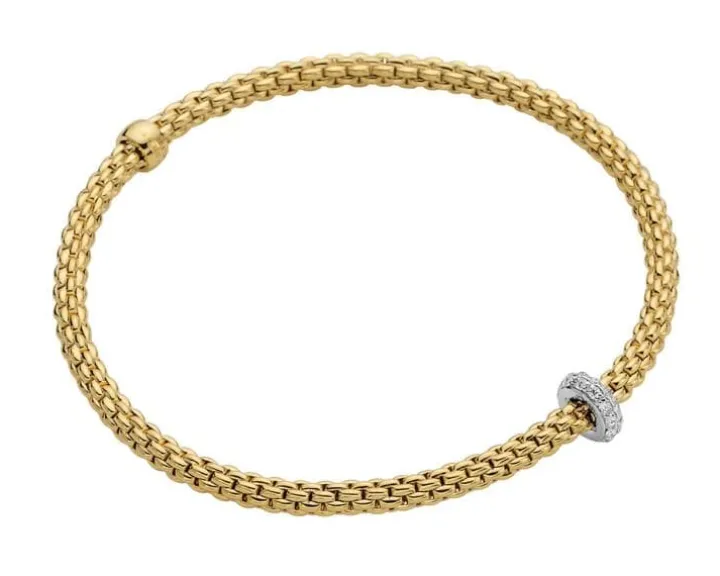 Bransoletka z żółtego i białego złota z brylantami - 0,18 ct - próba 750