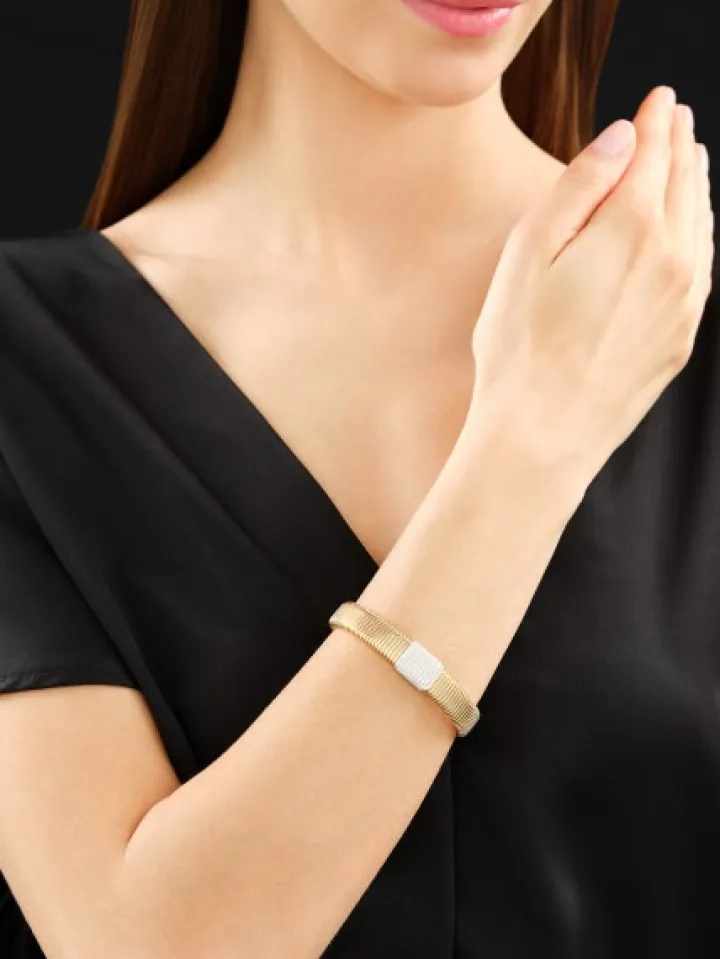 Bransoletka z żółtego i białego złota z brylantami - 0,68 ct - próba 750