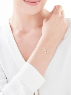 Bransoletka z żółtego i różowego złota z diamentami - róża, nieskończoność - 0,06 ct - próba 375