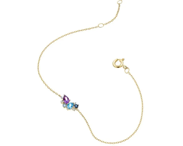 Bransoletka z żółtego złota z diamentami, topazami i ametystem - próba 375