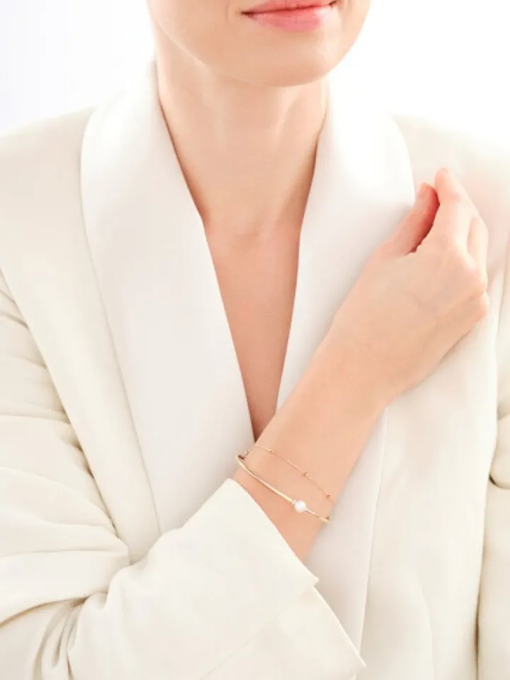 Bransoletka z żółtego złota z diamentami i perłą - próba 375