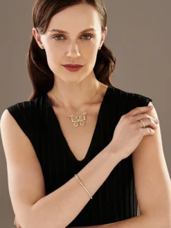 Broszka - zawieszka z żółtego złota z brylantami - motyl - 1,35 ct - próba 750