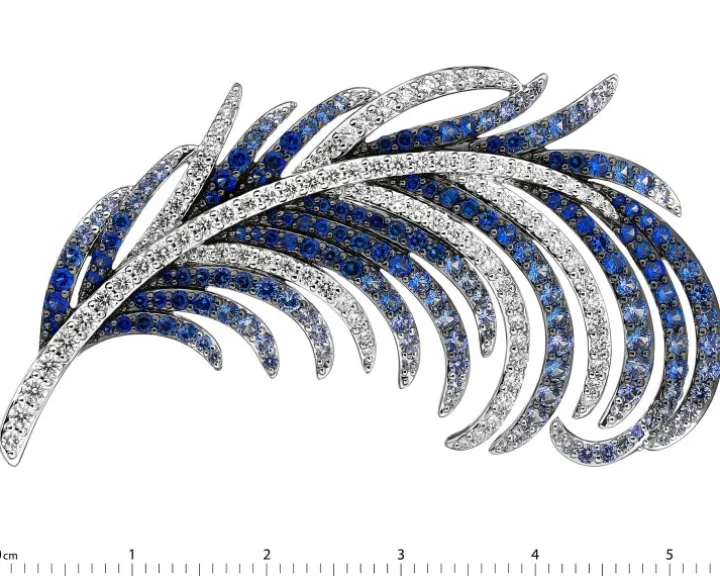 Broszka z białego złota z brylantami i szafirami cejlońskimi - piórko - próba 750