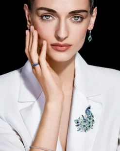 Broszka z białego złota z brylantami, kamieniami szlachetnymi i ozdobnymi - paw - próba 750