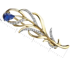Broszka z żółtego złota z diamentami i szafirem - piórko - próba 585