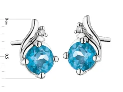 Kolczyki z białego złota z diamentami i topazami London Blue - próba 375