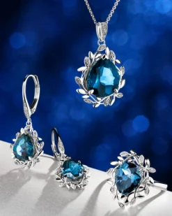 Kolczyki z białego złota z diamentami i topazami London Blue - próba 585