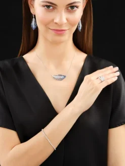 Kolczyki z białego złota z brylantami i szafirami cejlońskimi - piórka - próba 750