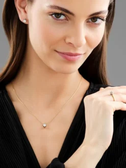 Kolczyki z żółtego i białego złota z brylantami - SI2/H - 0,68 ct - próba 585