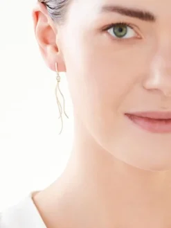 Kolczyki z żółtego i białego złota z diamentami - 0,006 ct - próba 585