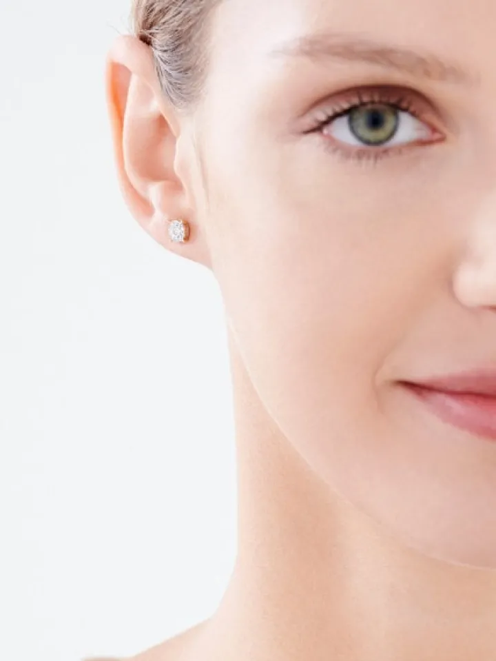 Kolczyki z żółtego i białego złota z brylantami - 0,18 ct - próba 585