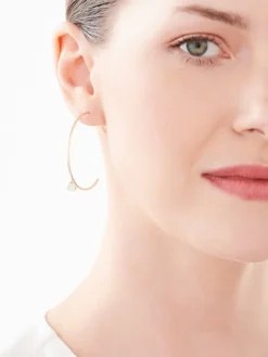 Kolczyki z żółtego i białego  złota z brylantami - koła - 0,01 ct - próba 375