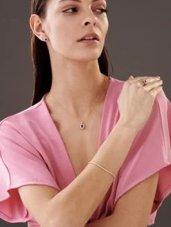 Kolczyki z żółtego złota z brylantami i rubinami - próba 585