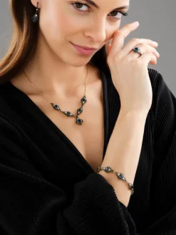 Kolczyki z żółtego złota z brylantami i topazami London Blue - próba 585