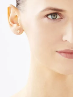 Kolczyki z żółtego złota z brylantami - serca - 0,006 ct - próba 375