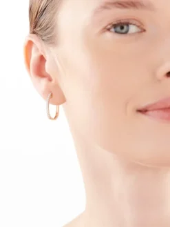 Kolczyki z żółtego złota z brylantami - koła - 0,25 ct - próba 585