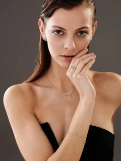 Kolczyki z żółtego złota z brylantami i szmaragdami - próba 585