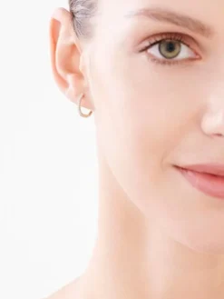 Kolczyki z żółtego złota z diamentami - koła - 0,12 ct - próba 585