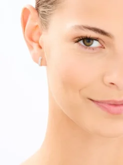 Kolczyki z żółtego złota z diamentami - koła - 0,20 ct - próba 585