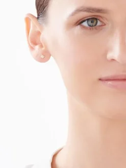 Kolczyki z żółtego złota z diamentami - gwiazdy - 0,006 ct - próba 375