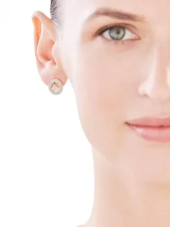 Kolczyki z żółtego złota z diamentami - rozety - 0,18 ct - próba 585