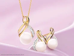 Kolczyki z żółtego złota z diamentami i perłami - próba 585