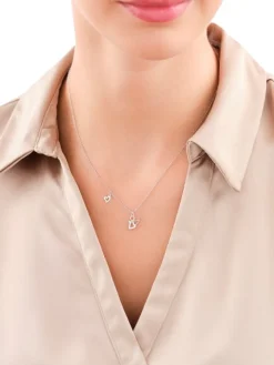 Naszyjnik srebrny z cyrkoniami - aniołek, serce