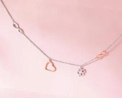 Naszyjnik z białego i różowego złota z diamentami - serce, nieskończoność, koniczyna - 0,01 ct - próba 375