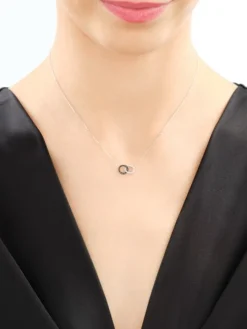 Naszyjnik z białego złota z diamentami - koła - 0,10 ct - próba 375