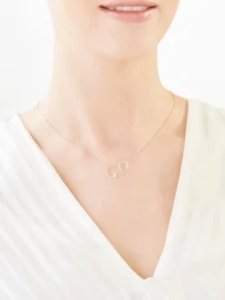 Naszyjnik z żółtego i białego złota z brylantem - koła - 0,008 ct - próba 375