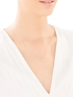 Naszyjnik z żółtego złota z brylantem - krzyż - 0,01 ct - próba 375