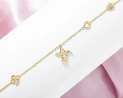 Naszyjnik z żółtego złota z diamentami - koliber, serce, kwiat, koniczyna - 0,01 ct - próba 375