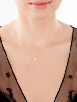 Naszyjnik z żółtego złota z diamentami - kwiaty - 0,06 ct - próba 375