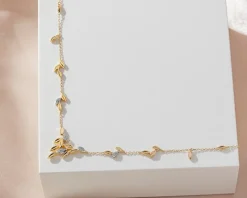 Naszyjnik z żółtego złota z diamentami - liście - 0,05 ct - próba 585