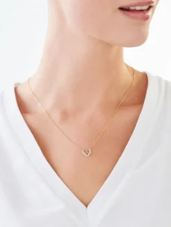 Naszyjnik z żółtego złota z diamentem - skrzydła, serce - 0,005 ct - próba 375