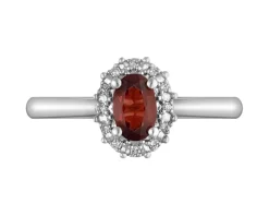 Pierścionek z białego złota z diamentami i granatem - próba 585