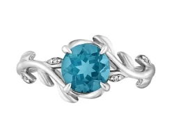 Pierścionek z białego złota z diamentami i topazem London Blue - próba 375