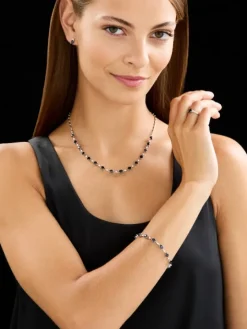 Pierścionek z białego złota z brylantami i szafirem - próba 750