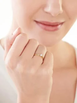 Pierścionek z żółtego i białego złota z brylantem - 0,10 ct - próba 585