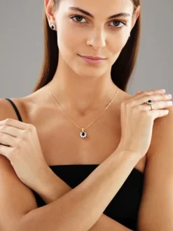 Pierścionek z żółtego i białego złota z brylantami i szafirem - próba 585